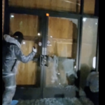 Windows being smashed at Maersk Emeryville.